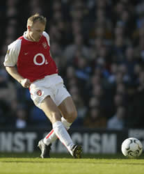 Dennis Bergkamp scores Arsenal's opening goal.....