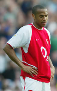 Thierry Henry dejected after Arsenal lose the title.....