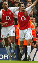 Jeffers celebrates his goal v Charlton with Thierry Henry....
