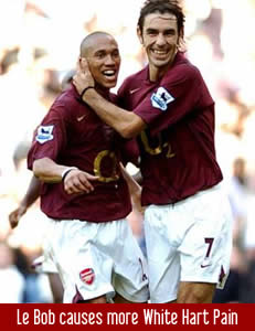 Pires and Clichy celebrate Arsenal's equaliser