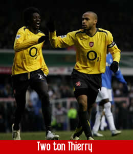 Thierry Henry celebrates his 200th Arsenal goal