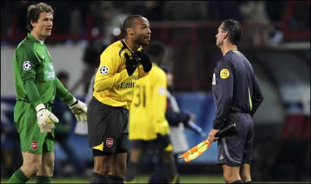 Henry remonstrates with the stupid Spanish linesman