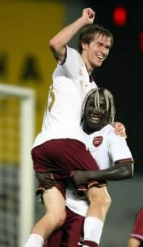 Sagna feels up Hleb's arse