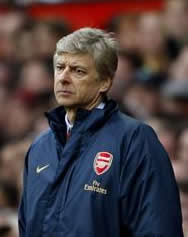 Arsene unhappy as the title slips away...