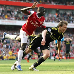 Eboue fouls Lucas for Liverpool's penalty